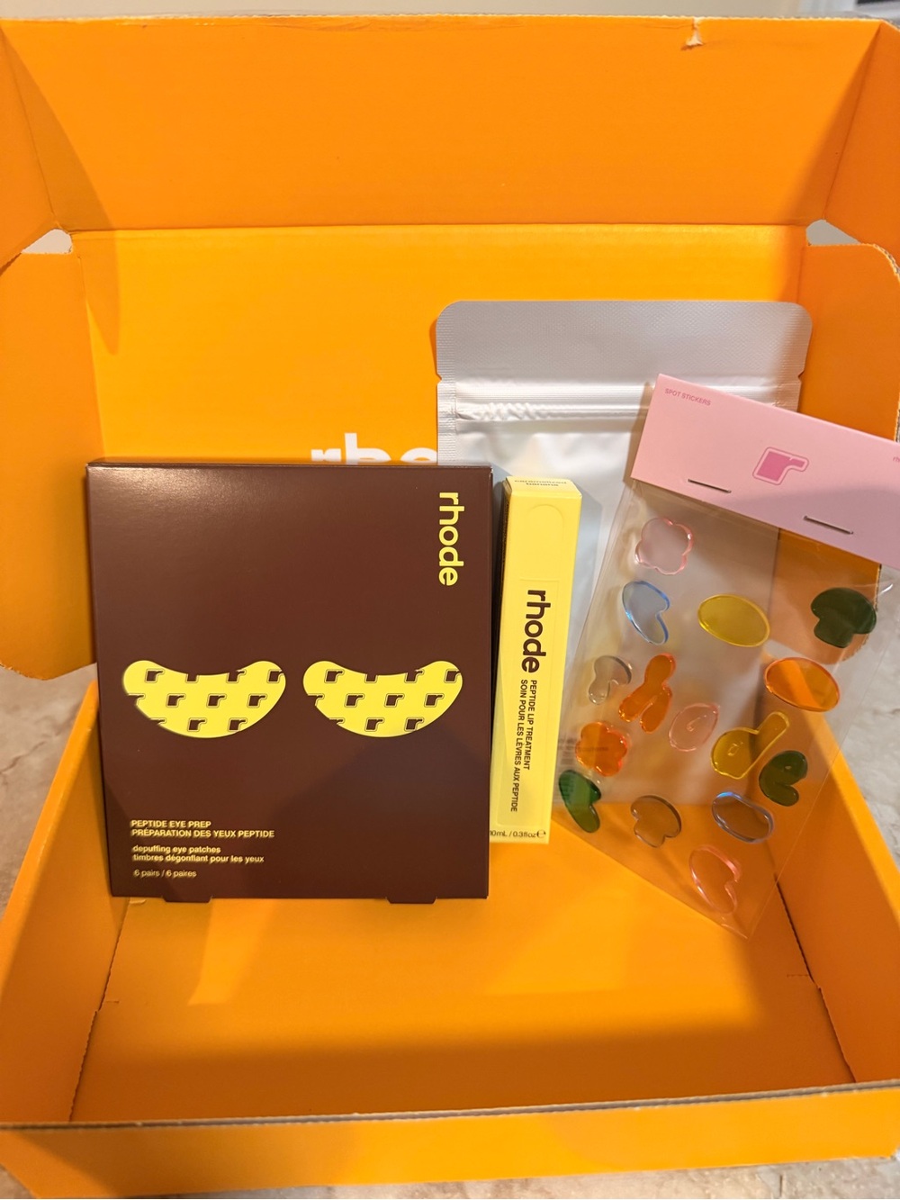 Rhode limited edition kit eye patches , pimple and banana caramelized lip tint